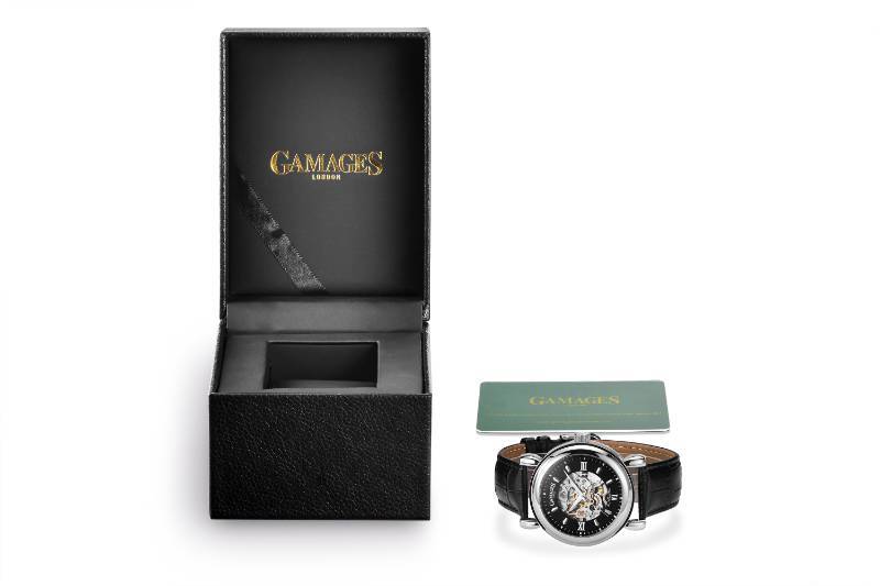 lot 91 image: GAMAGES OF LONDON Limited Edition Skeleton Automatic Steel Timepiece - $700 MSRP