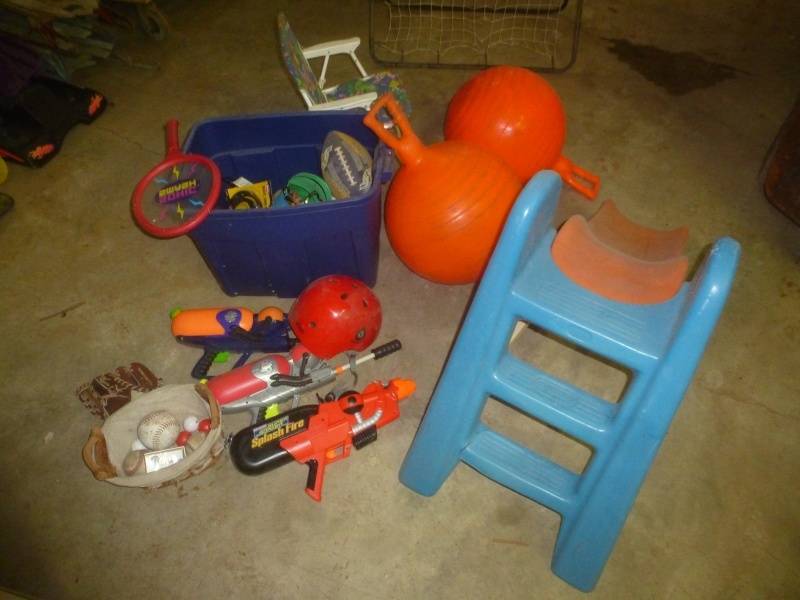 lot 55 image: Hockey Net, Squirt Guns, Helmets, Jumping Balls
