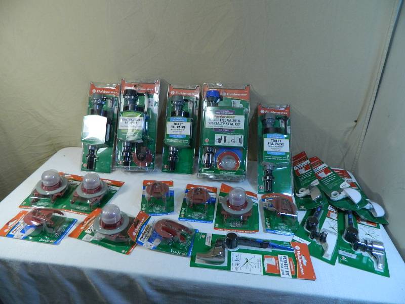 lot 96 image: Large Assortment of New Toilet Parts