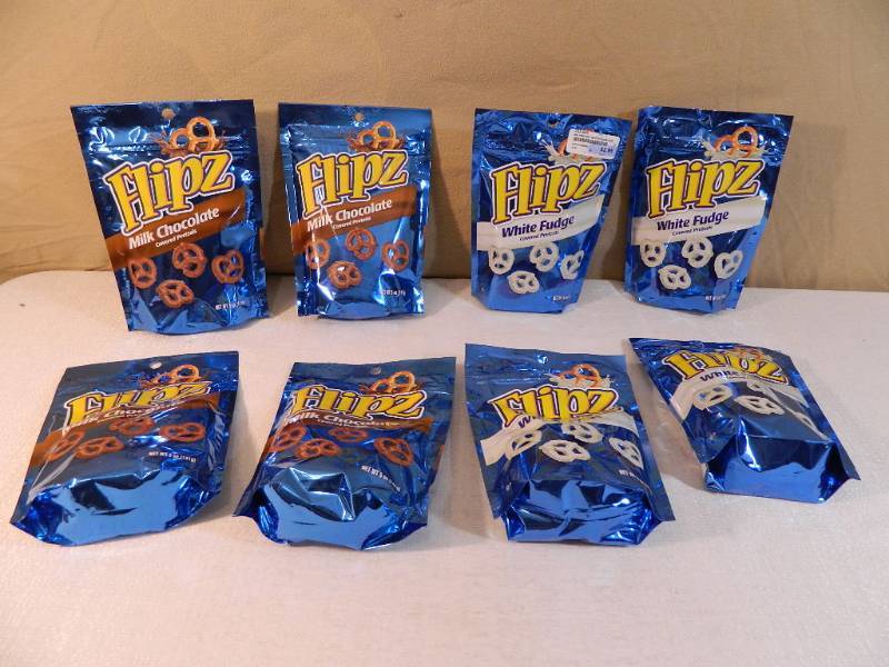 lot 102 image: 8 New Bags of Flipz Covered Pretzels