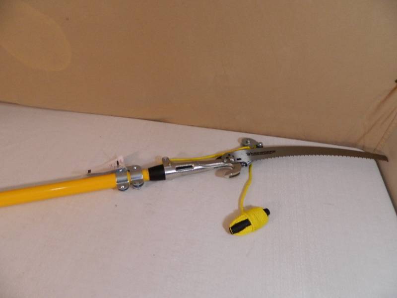 lot 141 image: New 14 ft Telescoping Tree Trimmer