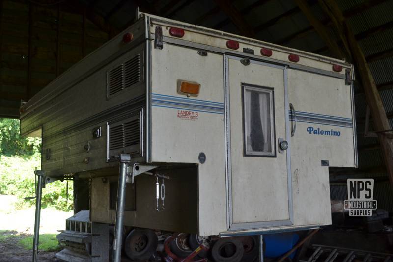 lot 20 image: Palomino Mini L Pop-Up Pickup Bed Camper