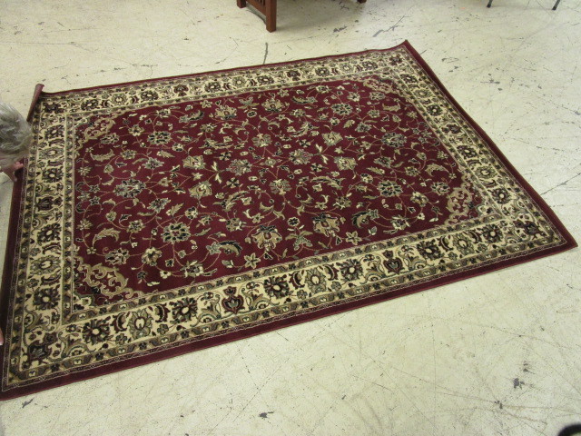lot 101 image: RADICI USA AREA RUG