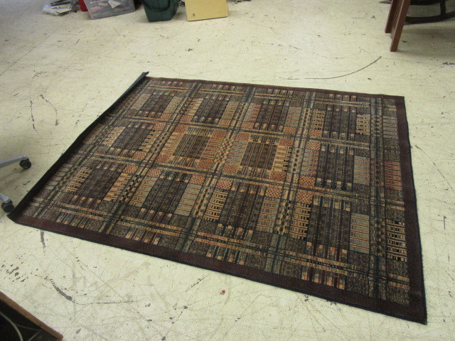 lot 102 image: MIRAGE AREA RUG