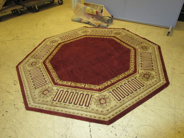 lot 103 image: WOOL HEXAGON AREA RUG