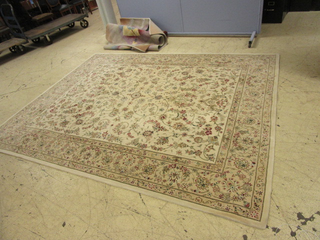 lot 104 image: MER AREA RUG