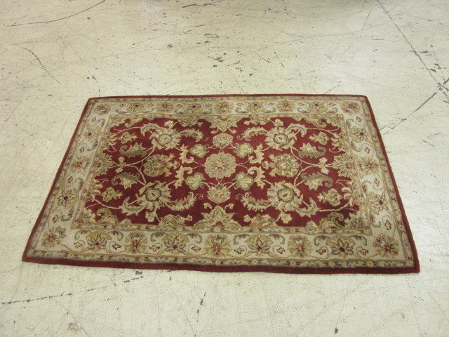 lot 106 image: DALYN AREA RUG