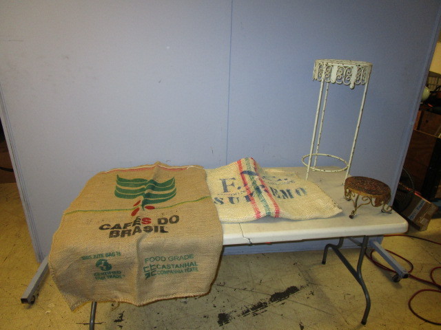 lot 192 image: COFFEE BEAN BURLAP SACKS AND TWO PLANT STANDS