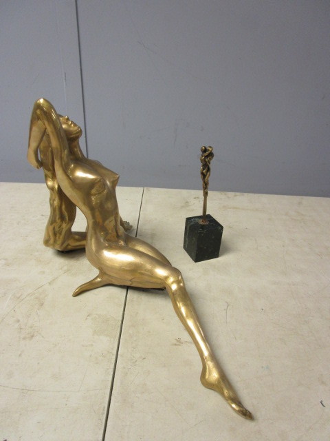 lot 199 image: BRASS STATUE OF A WOMAN IN REPOSE AND AN EMBRACE LETTER OPENER