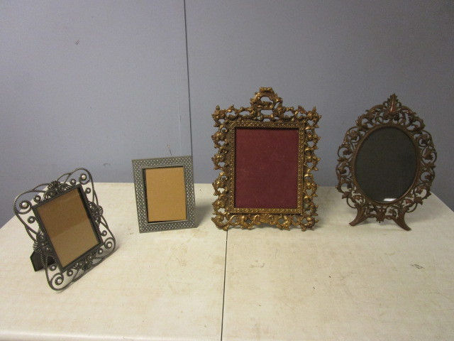lot 207 image: METAL PICTURE FRAMES AND A MIRROR