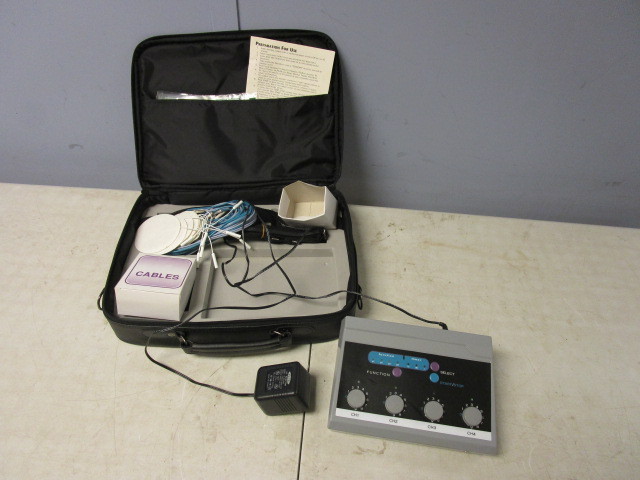 lot 240 image: TENS MACHINE