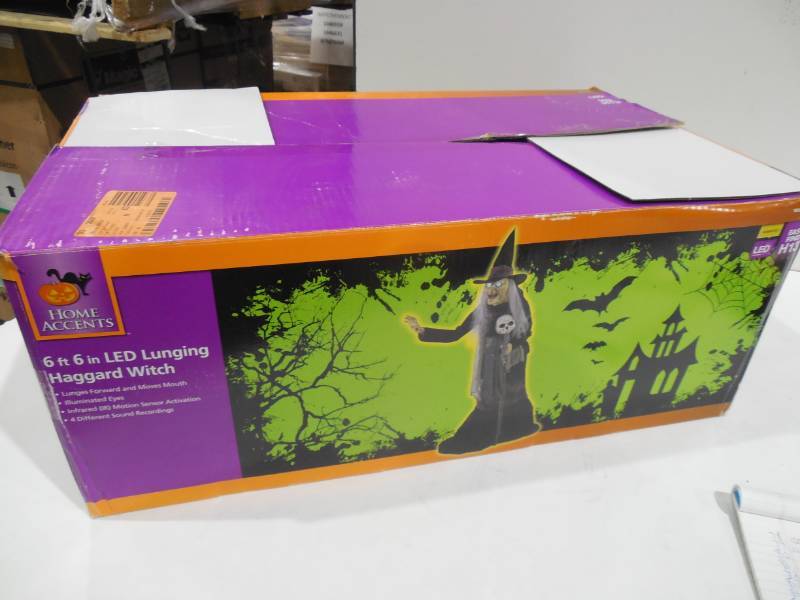 lot 88 image: HOME ACCENTS 66 LED LUNGED HAGGARD WITH LED LIGHT UP