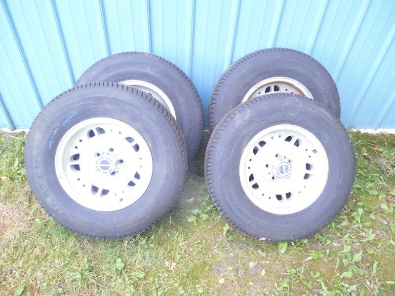 (4) MATCHING RIMS AND TIRES