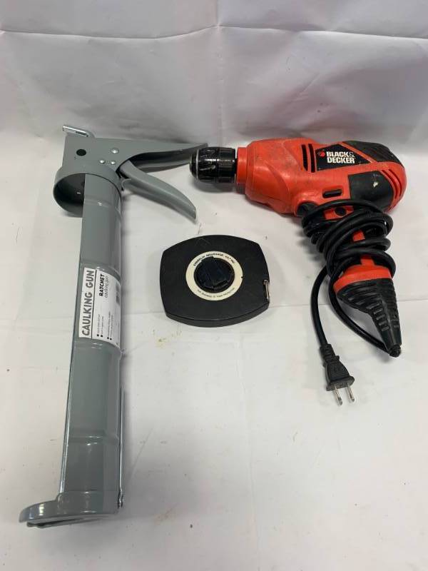 lot 66 image: Black & Decker Drill, Enderlin Insurance Tape Measure, Caulk Gun