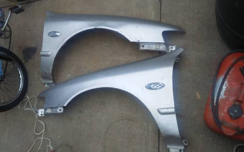 lot 28 image: Pair Of Fenders With Cool Flame Design