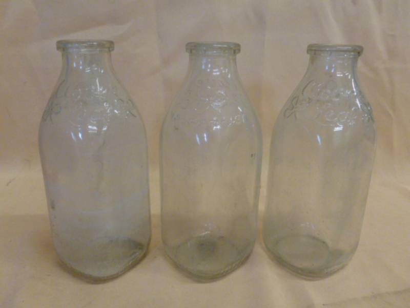 lot 28 image: Vintage Milk Bottles