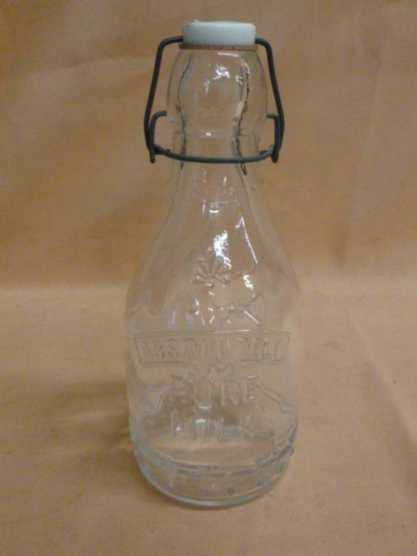 lot 100 image: Vintage Milk Bottle