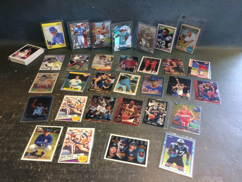 lot 13 image: Rod Carew Rookie and Over 70 Sports Cards