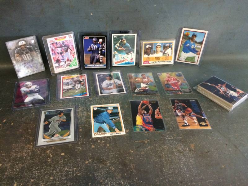 lot 19 image: Sports Cards with Sanders, Raines, Griffey and More