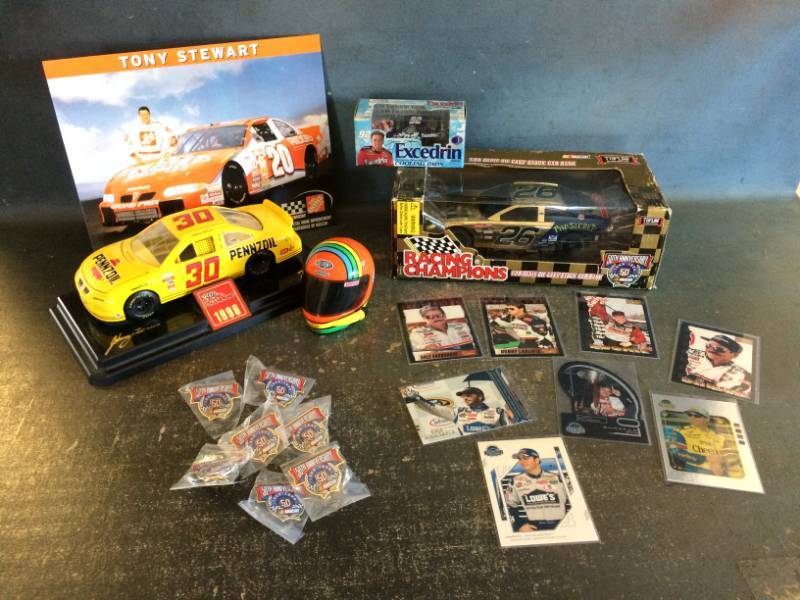 lot 100 image: NASCAR Collectibles with Die Cast Metal Car, Rare Jimmie Johnson Car, Jeff Gordon Mini Helmet and More