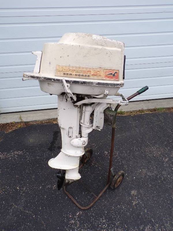 lot 2 image: 10 HP Johnson Outboard Motor Stand not included
