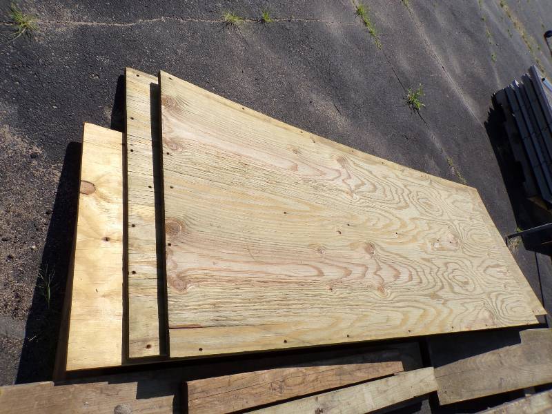 lot 46 image: 34 Treated Plywood 3x 5, 2 x 8, 3 x 8