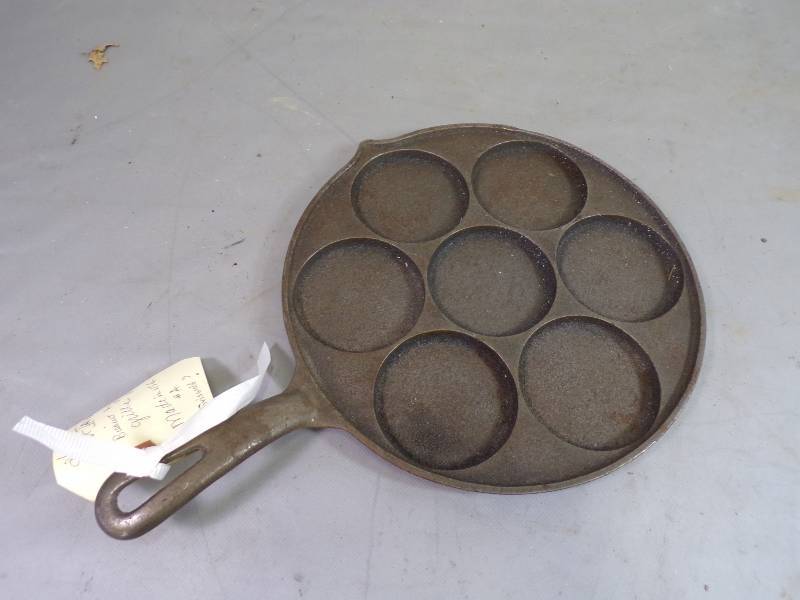 lot 62 image: Cast Iron Muffin Pan Made in USA