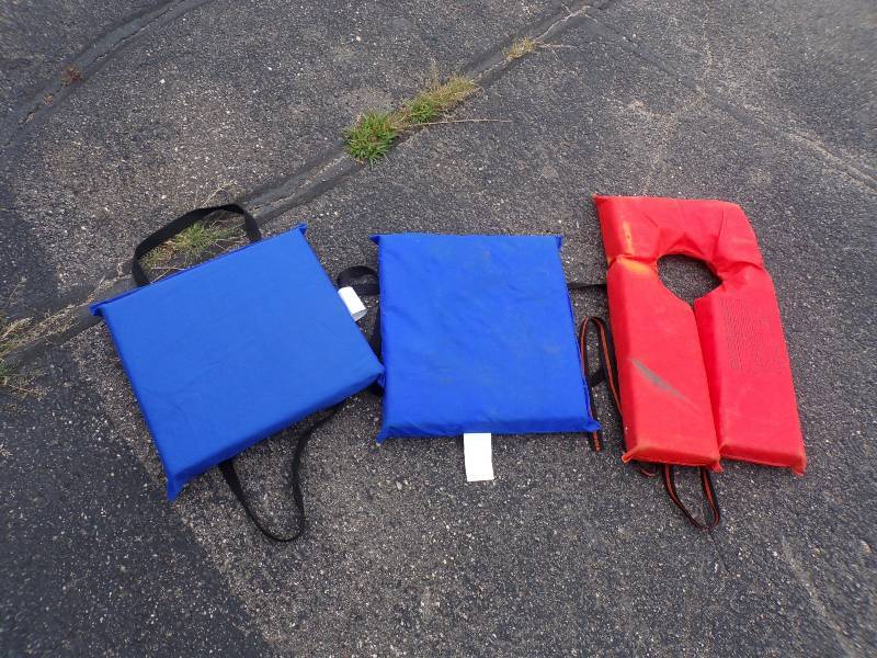 lot 69 image: Pair of Boat Cushions and Life Jacket