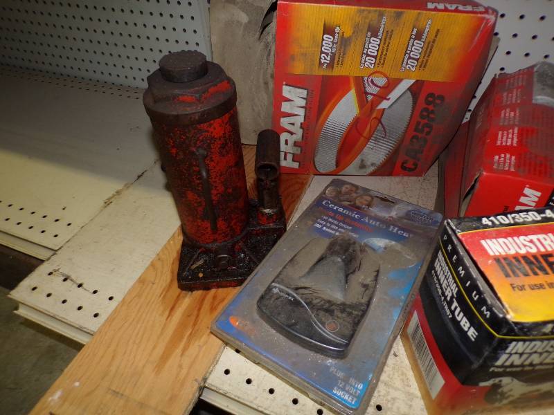 lot 172 image: Hydralic Jack, Car heater, Air Filter, Vintage Cans and more