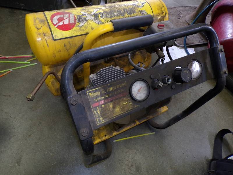lot 199 image: 4 Gallon Dual Tank Air Compressor