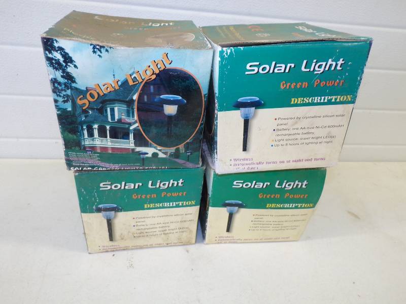 lot 232 image: 4 Solar Lights