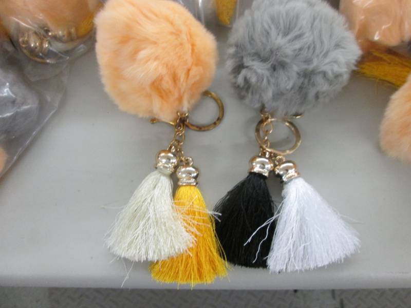 lot 53 image: Large Lot of Fuzzy Keychain Pairs...