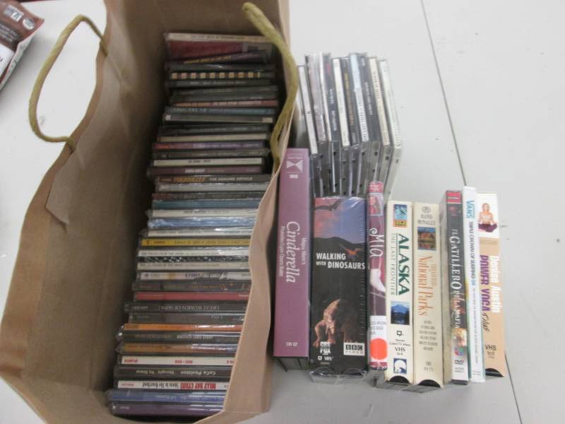 lot 64 image: Large Lot Music CDs, VHS items...