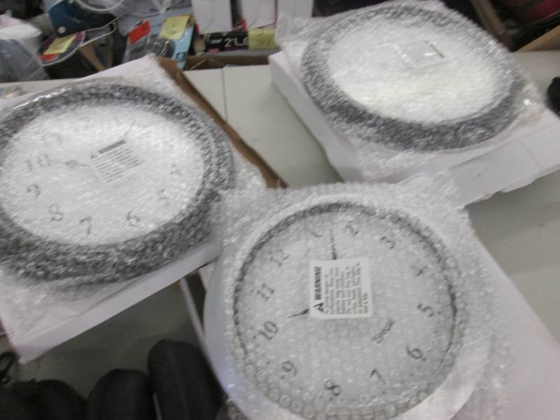 lot 102 image: 3 Wall Clocks open box, 1 has broke...