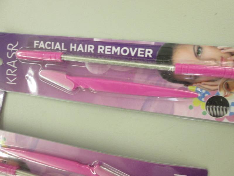 lot 123 image: 12 Facial Hair Removers...