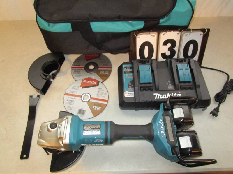 lot 30 image: Makita LXT BL 7 Angle Grinder Kit