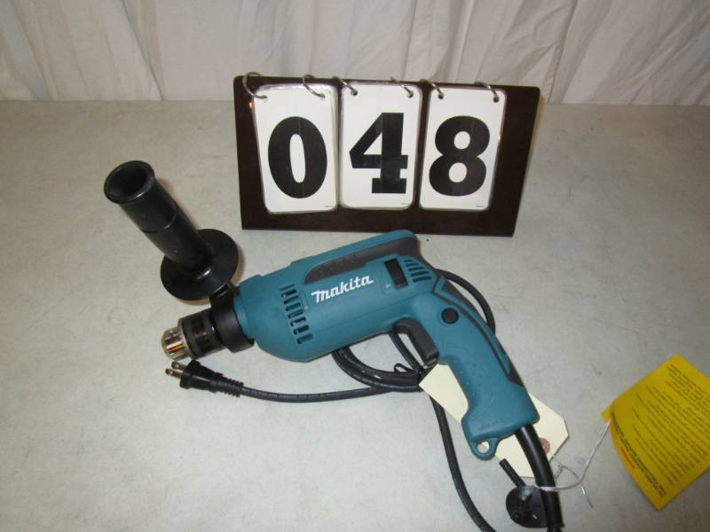 lot 48 image: Makita 12 Hammer Drill