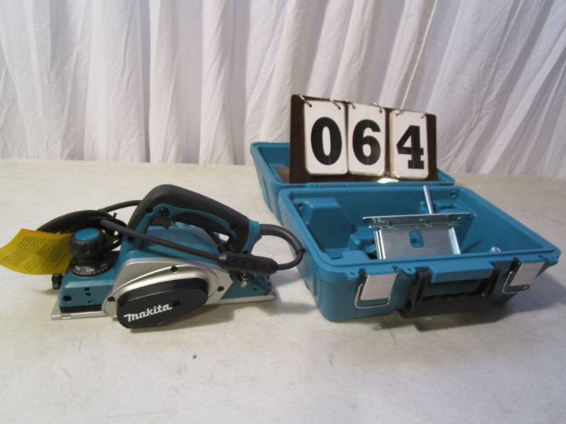 lot 64 image: Makita 3-14 Planer