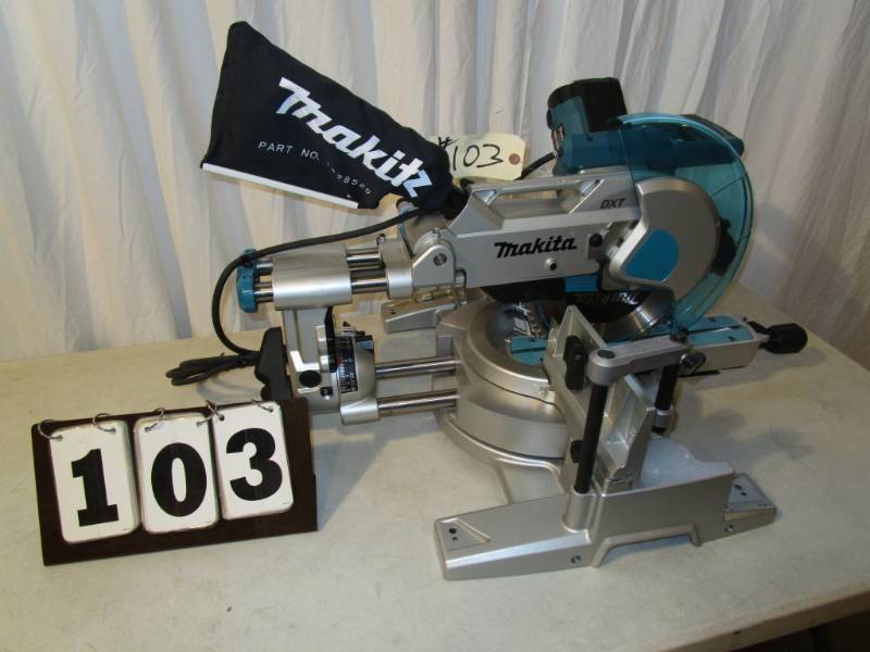 lot 103 image: Makita 10 Dual Slide Compound Miter Saw