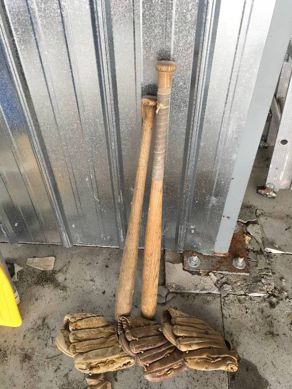 lot 147 image: Two Wood Baseball Bats & 3 Gloves
