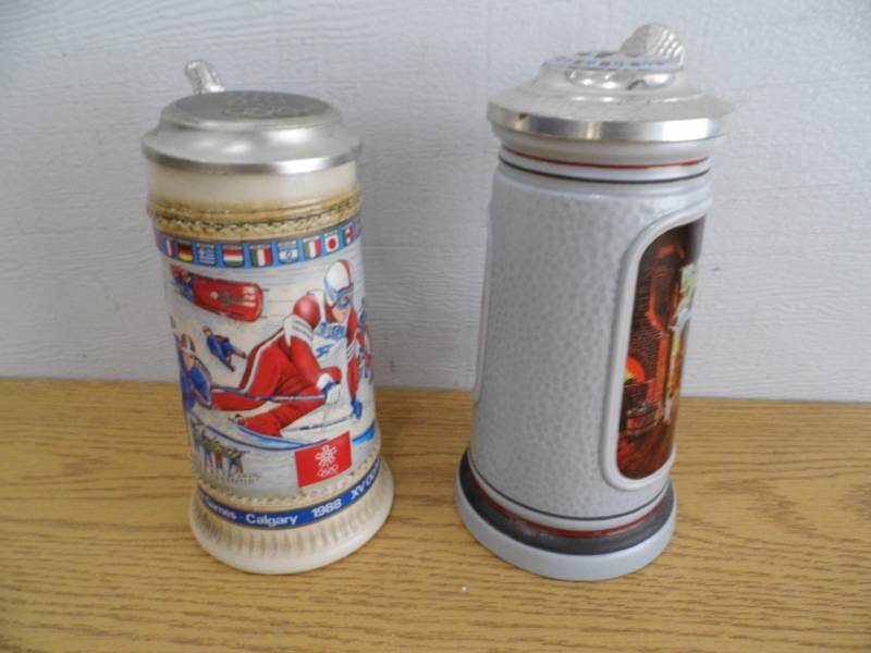 Lot of 2 Avon Steins