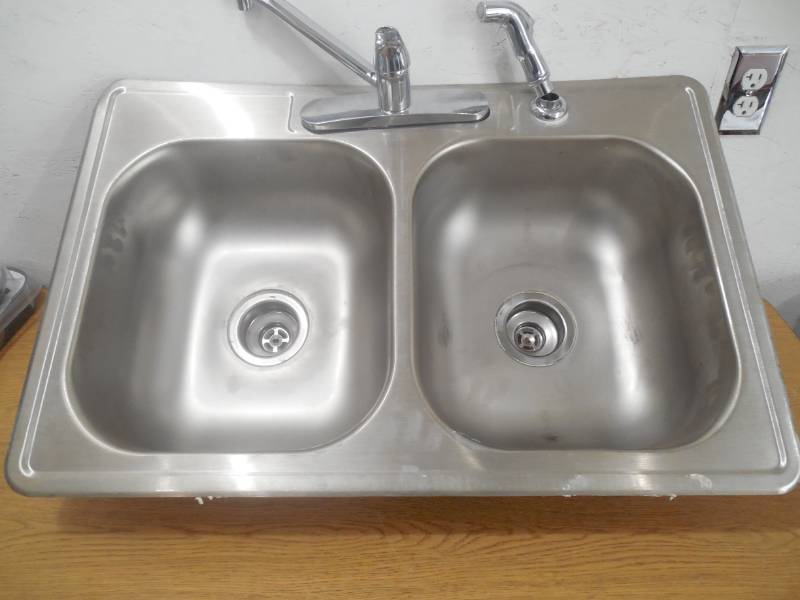 lot 53 image: All-in-One Drop-In Stainless Steel 33 in. 4-Hole Double Bowl Kitchen Sink