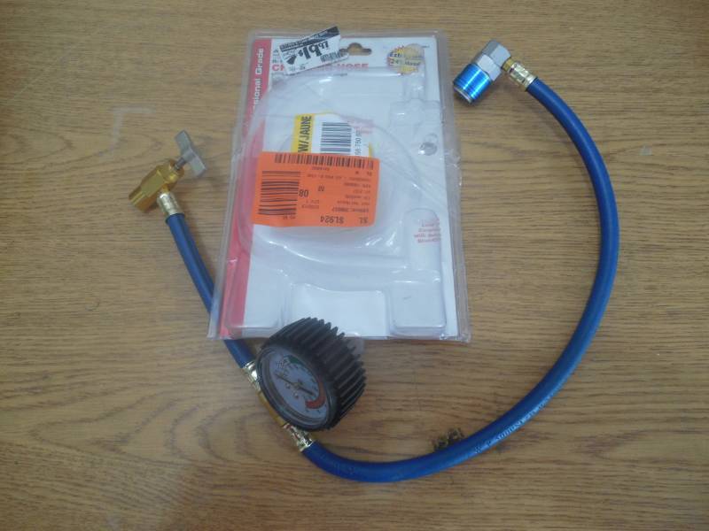 lot 97 image: AC Pro 24 in. R-134 Heavy Duty Charging Hose with Low Pressure Gauge