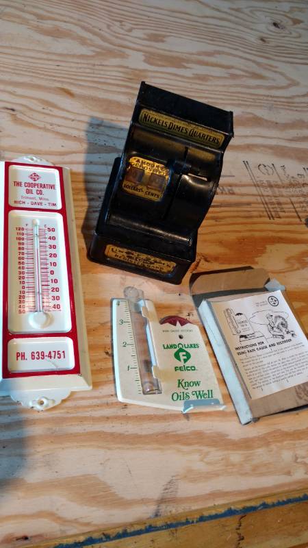 lot 100 image: Piggy bank, Rain gauge, Thermometer