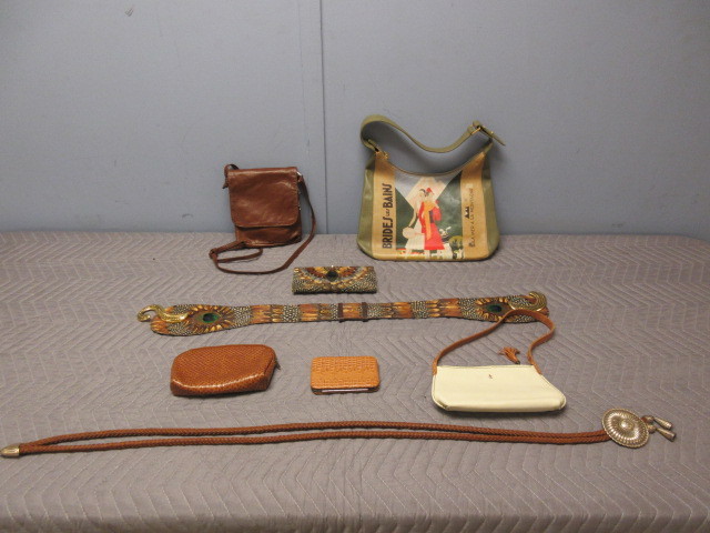 lot 349 image: ICON LEATHER HANDBAG, FEATHER ACCESSORIES AND LEATHER BELTS, MORE