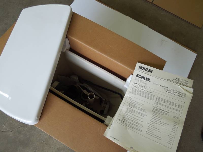 lot 33 image: Kohler Wellworth White Toilet Tank - New in Box