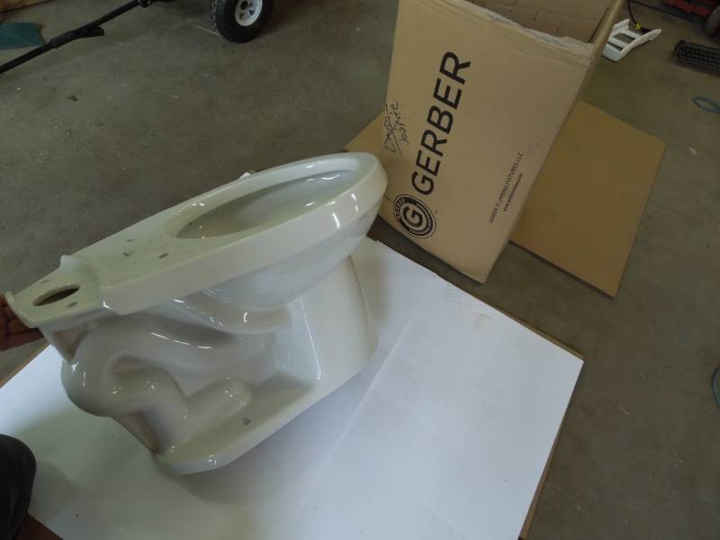 lot 36 image: Gerber Elongated Toilet - New in Box