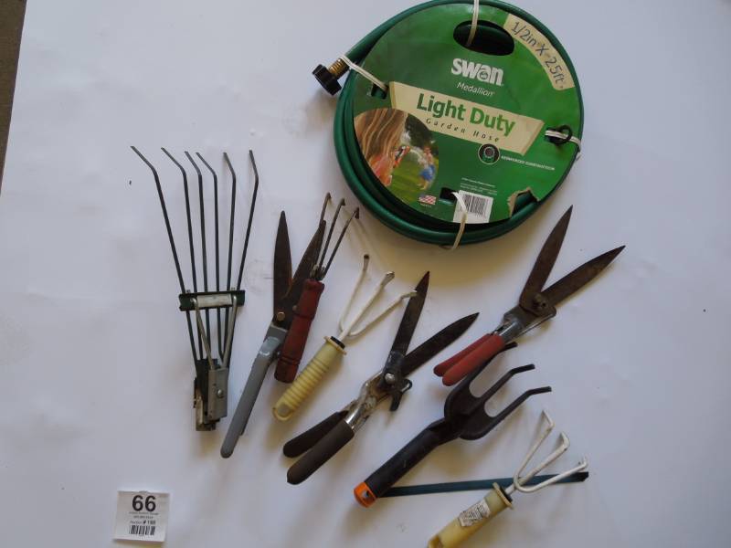 lot 66 image: New Garden Hose & Random Garden Tools