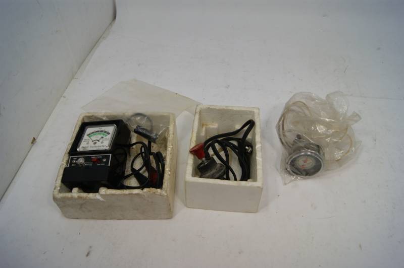lot 16 image: Vintage Testers and Car Parts