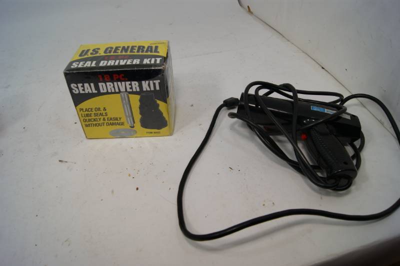 lot 19 image: NIB Seal Driver Kit and A Timing Light
